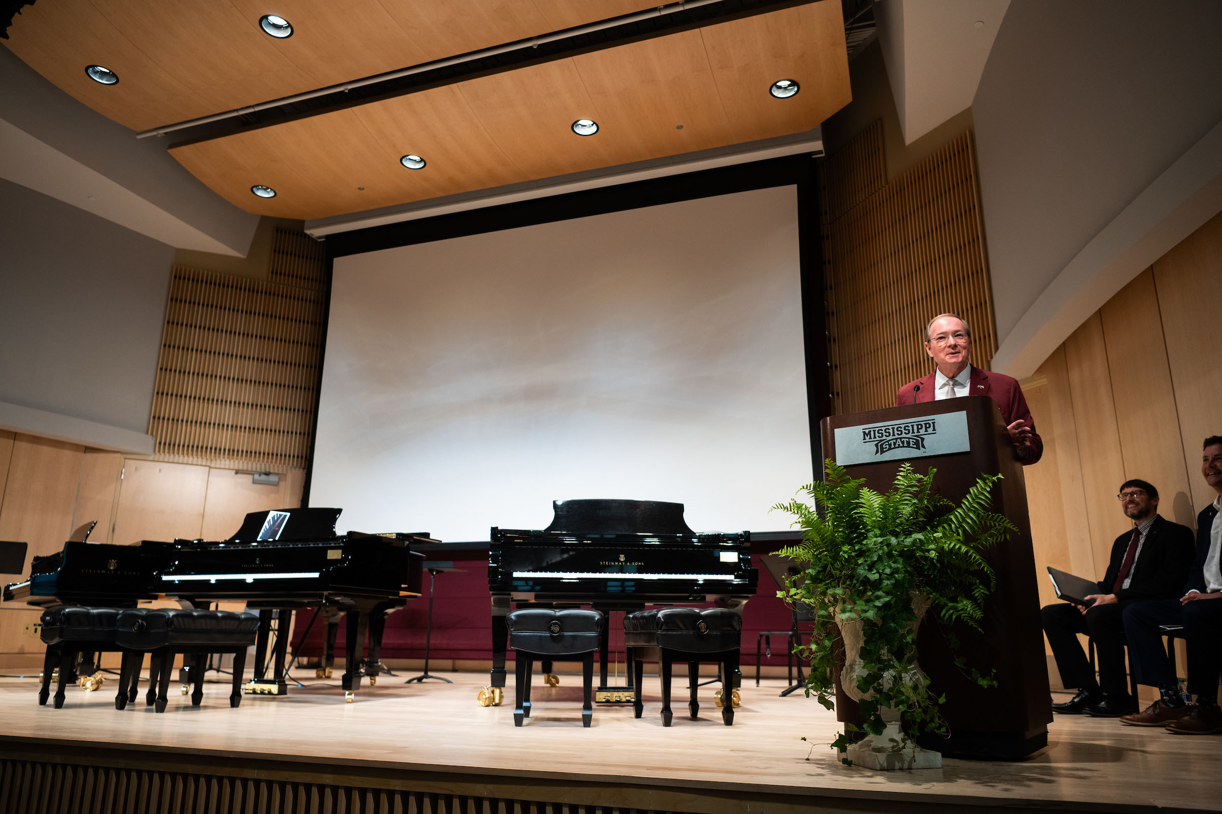 Dr. Keenum speaking onstage