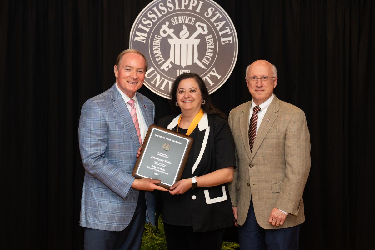 Dr. Sebba receives award from Dr. Keenum and Dr. Shaw